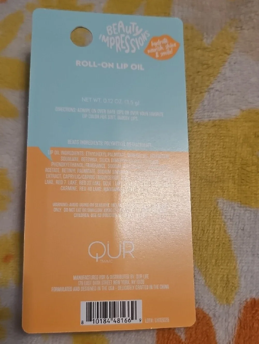 Impressions Roll-On Lip Oil in Orange Cap with Pastel Beads